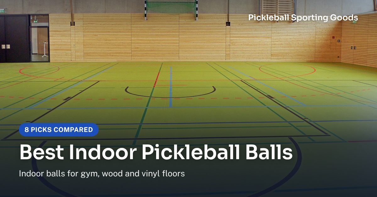 Empty indoor sports hall with a green court floor and painted court lines